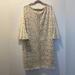 Beige dress size 18 with round neck, half sleeves and zipper at the back.